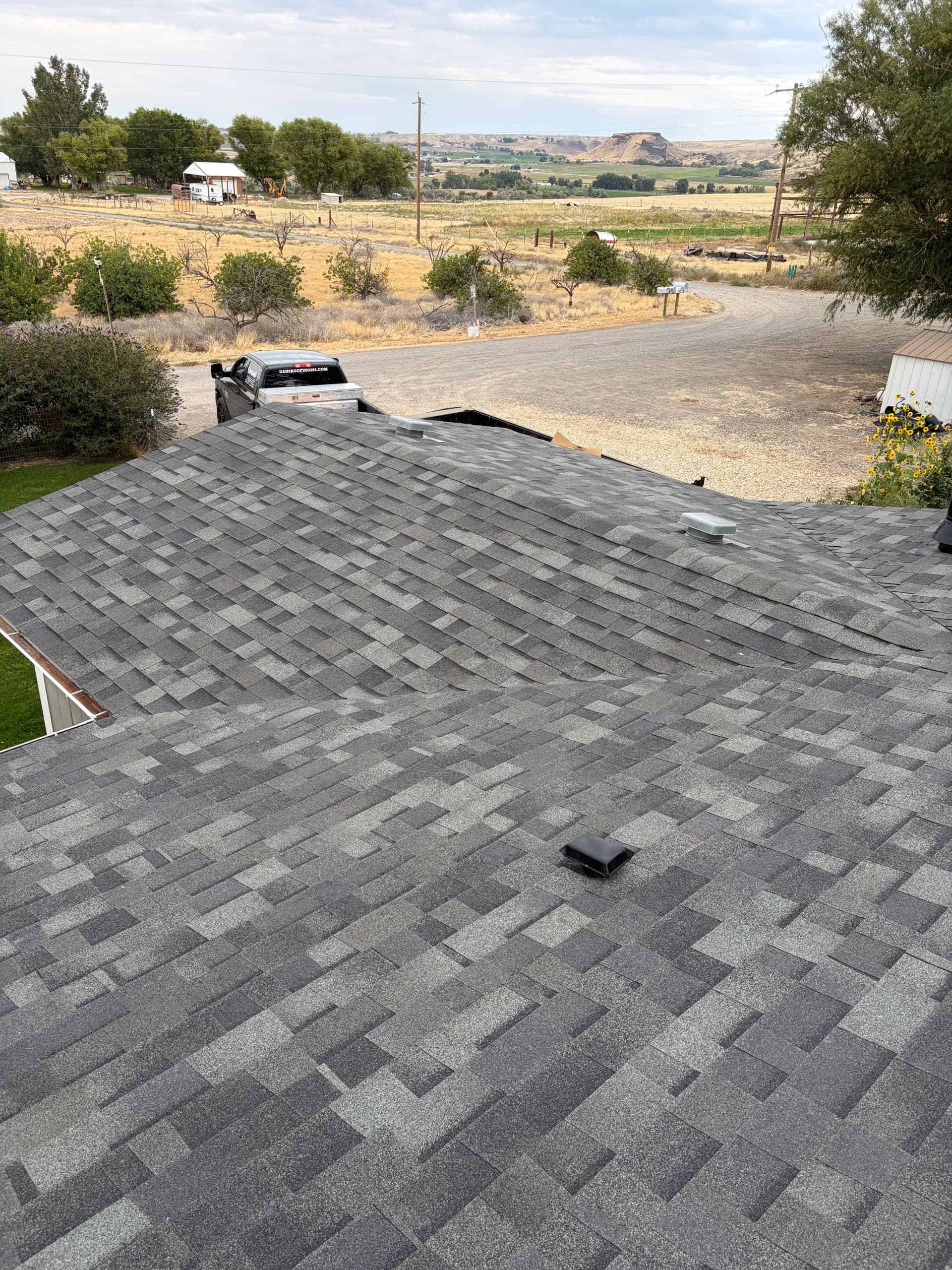 Gallery photos for Storm Gray Malarkey Shingles on a Large Rural Home: Image #1