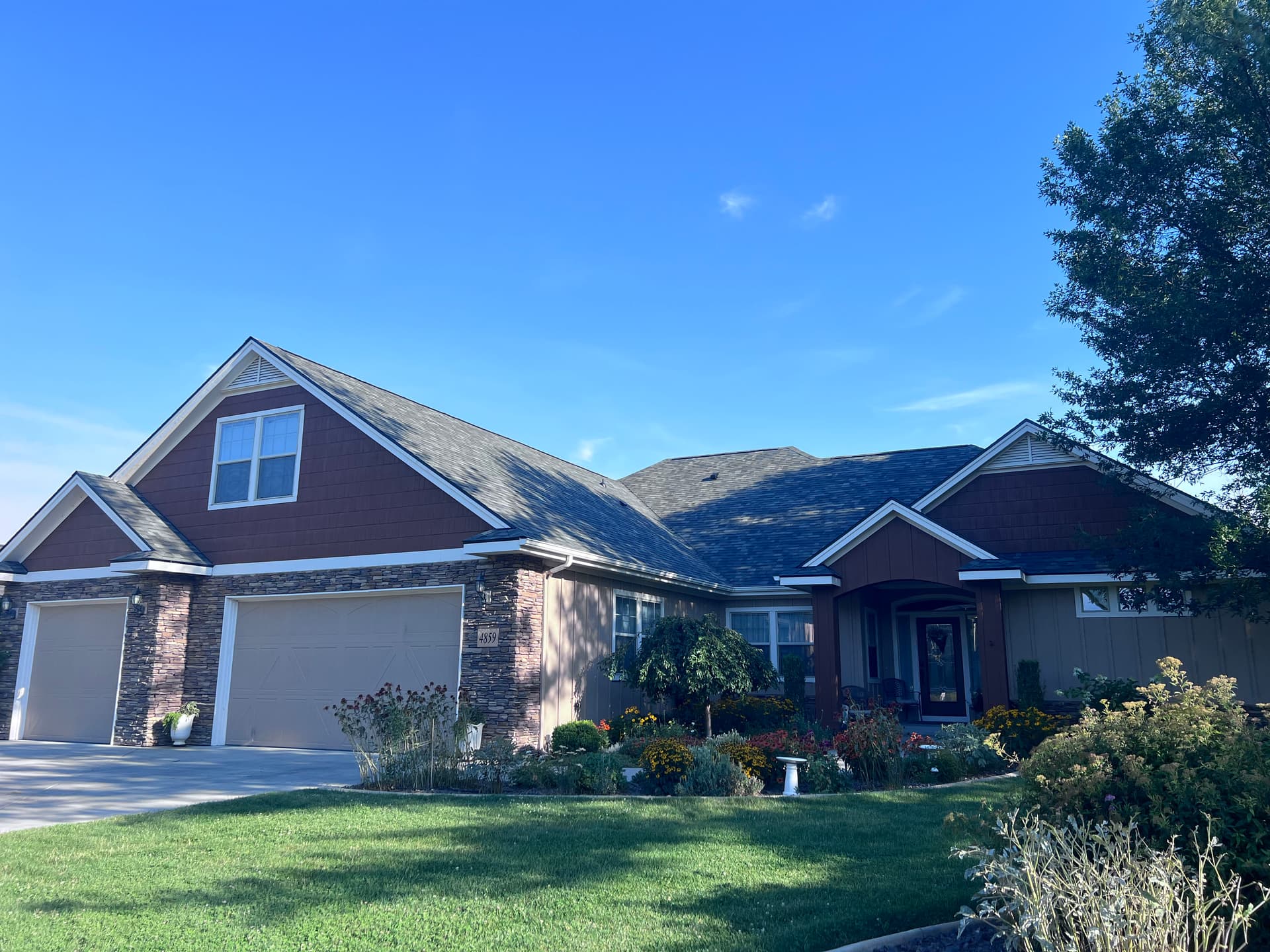 Full Re-Roof on a Home and Shop Using Malarkey Storm Gray Shingles