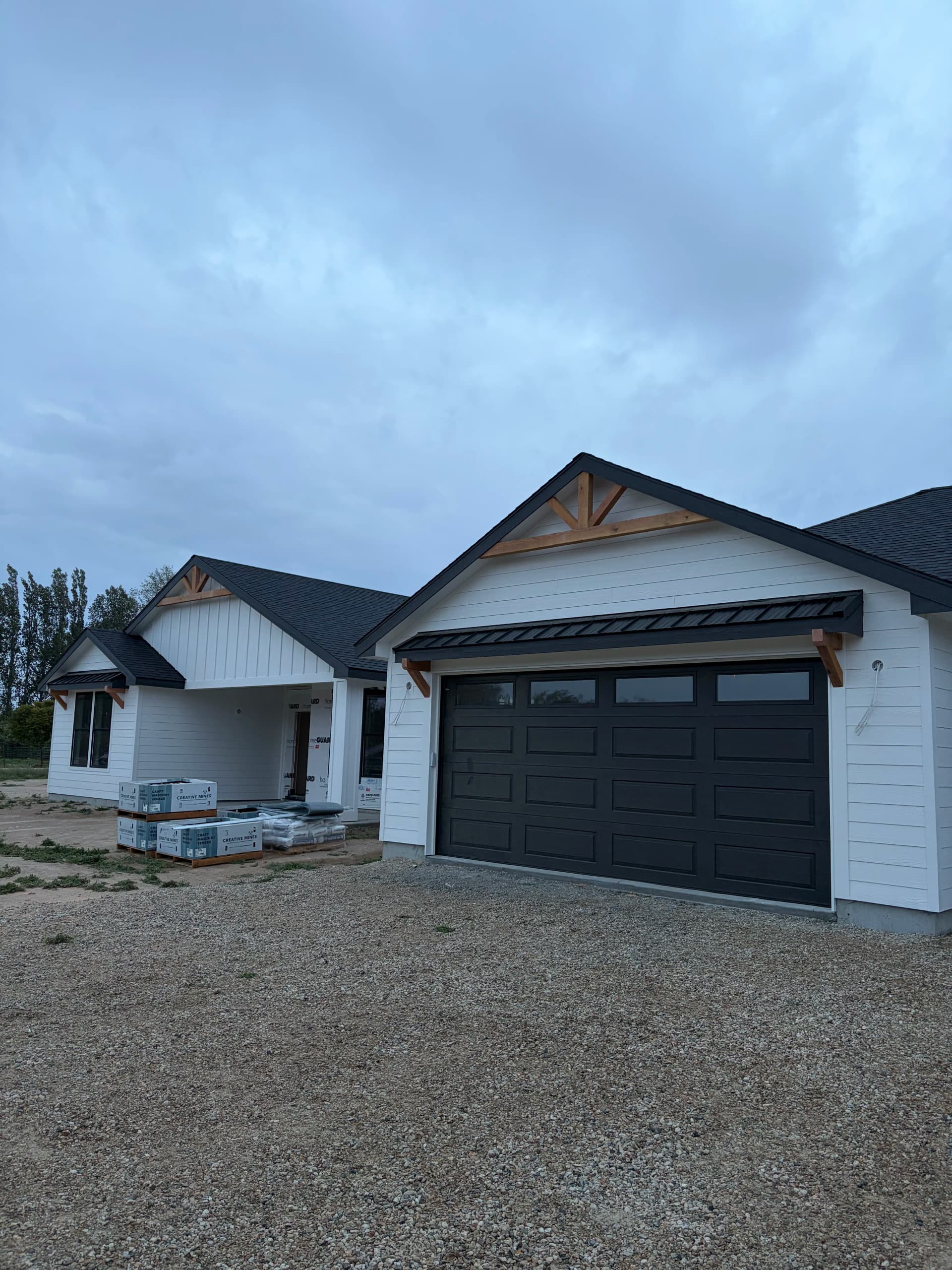 New Construction Roofing and Siding with High-Wind Shingles and Custom Accents image