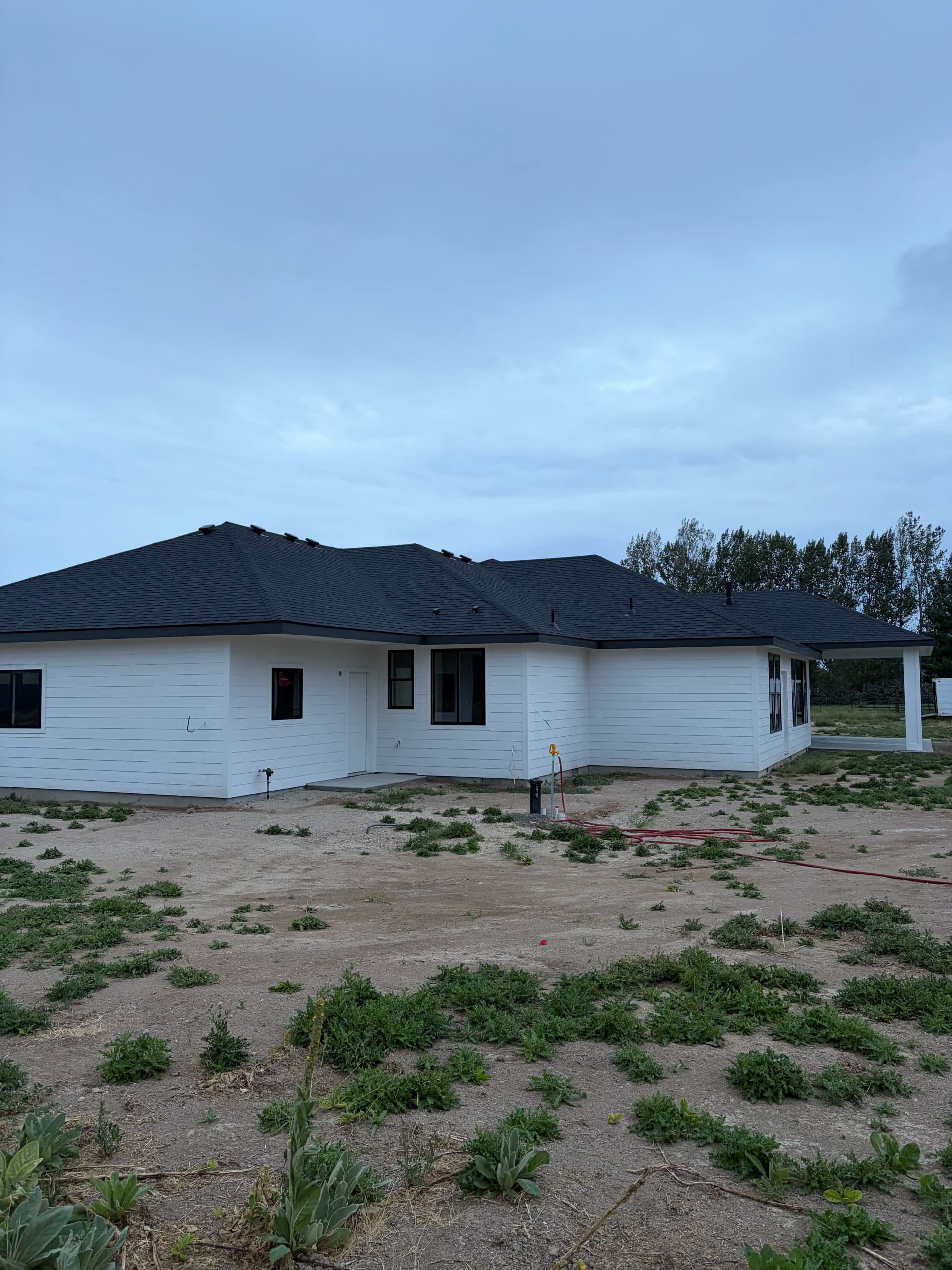 Gallery photos for New Construction Roofing and Siding with High-Wind Shingles and Custom Accents: Image #5