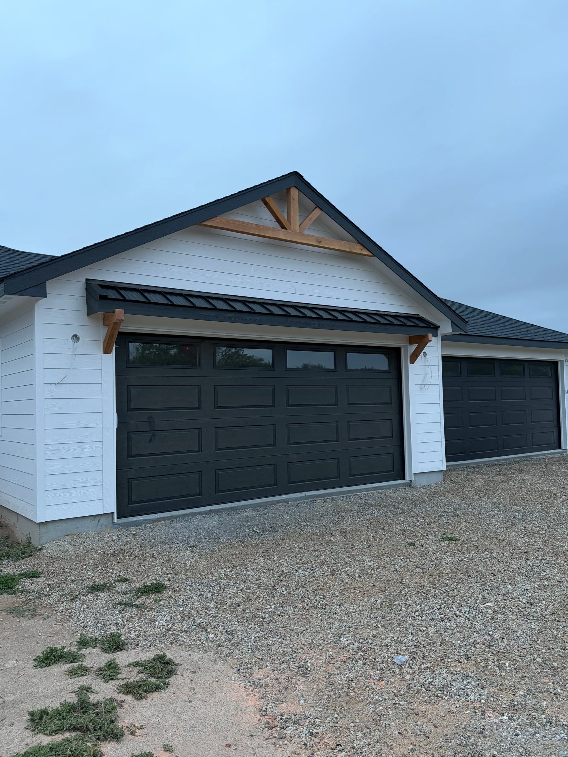 Gallery photos for New Construction Roofing and Siding with High-Wind Shingles and Custom Accents: Image #2